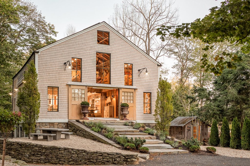 Stunning barn with beautiful landscaping and stone wall kellyelko.com #barn #architecture #curbappeal #landscaping 