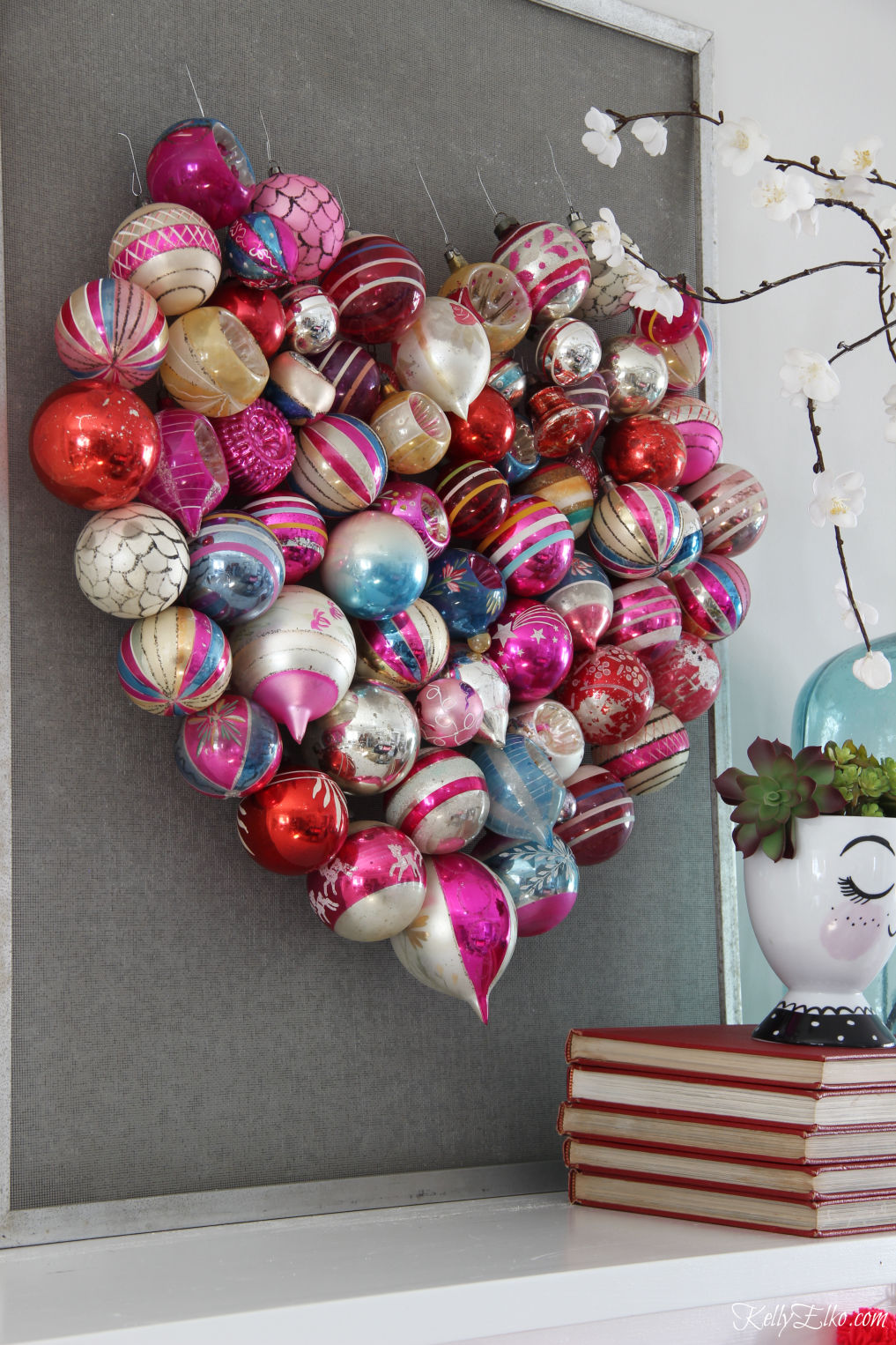 Love this DIY ornament heart made from vintage Christmas ornaments kellyelko.com