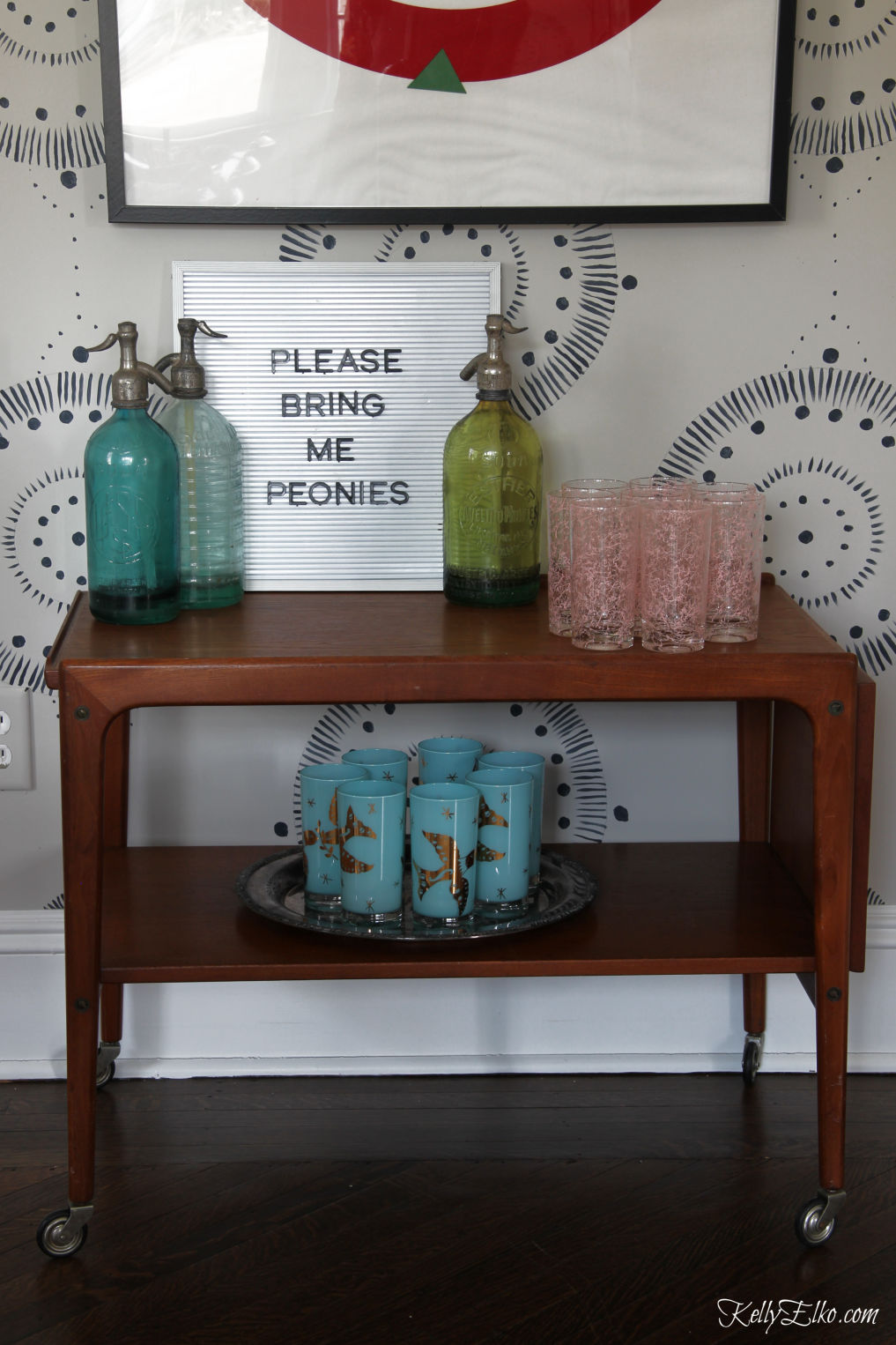 Love this vintage Danish bar cart and vintage glasses kellyelko.com #barcart #vintagedecor #danishmodern #letterboard #diningroomdecor 