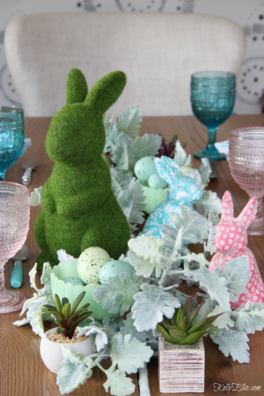 Love this cute spring bunny centerpiece with branches, succulents and bunnies kellyelko.com #springdecor #springcenterepiece #springtable #eastertable #eastercenterpiece #easterbunny 