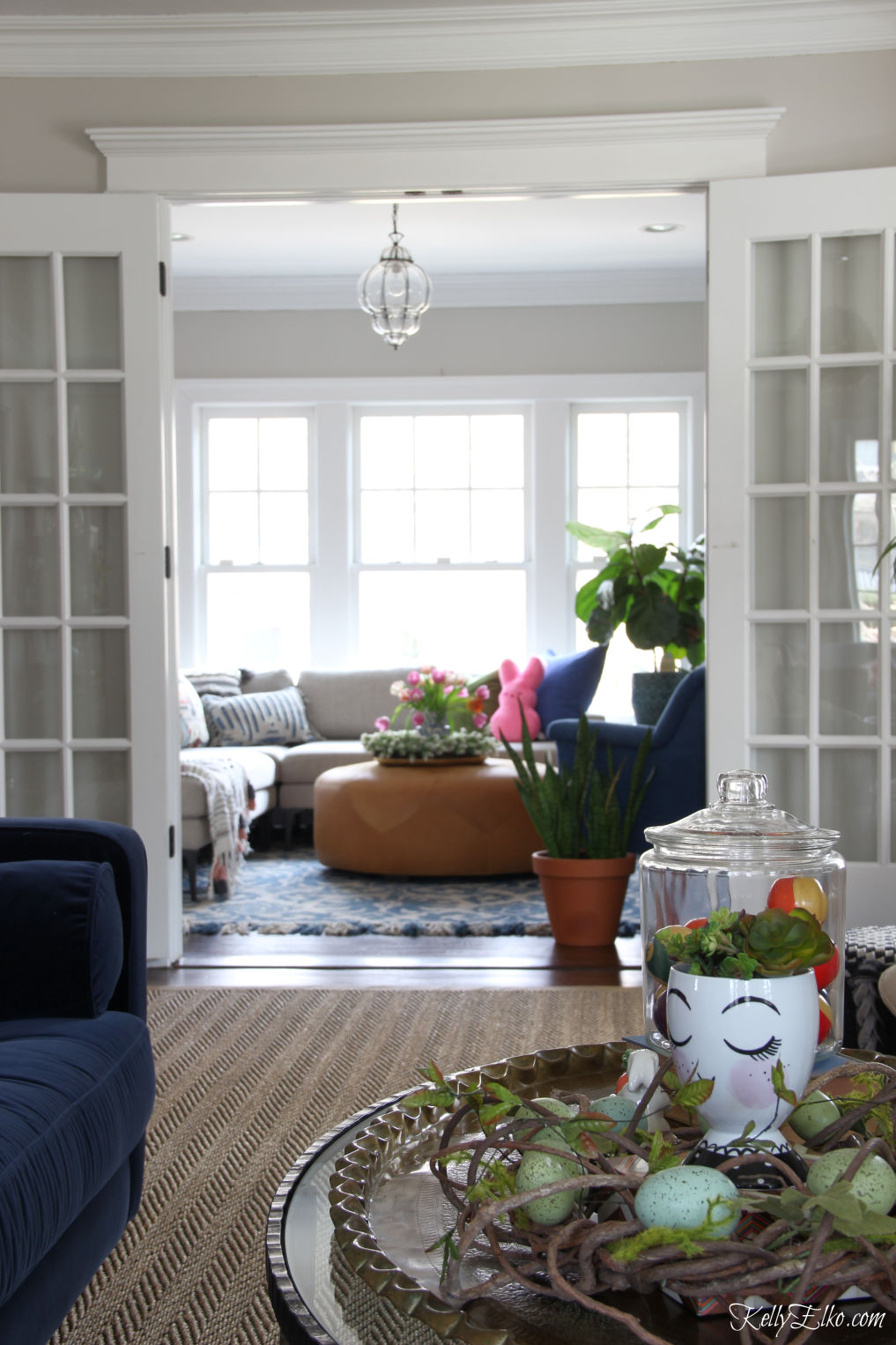 Love the French doors separating the living room from family room kellyelko.com #interiordecor #interiordesign #frenchdoors #livingroomdecor #familyroomdecor #springdecor 