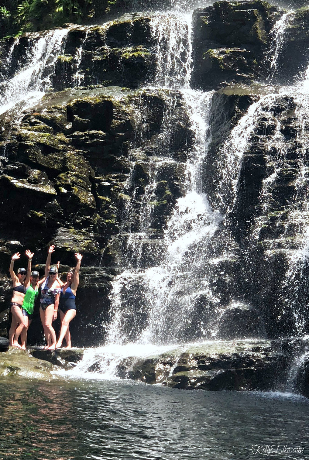 52 Weeks of Yes - swim under a waterfall! kellyelko.com #travel #waterfall #costarica #vacation #travelblog #52WeeksofYes