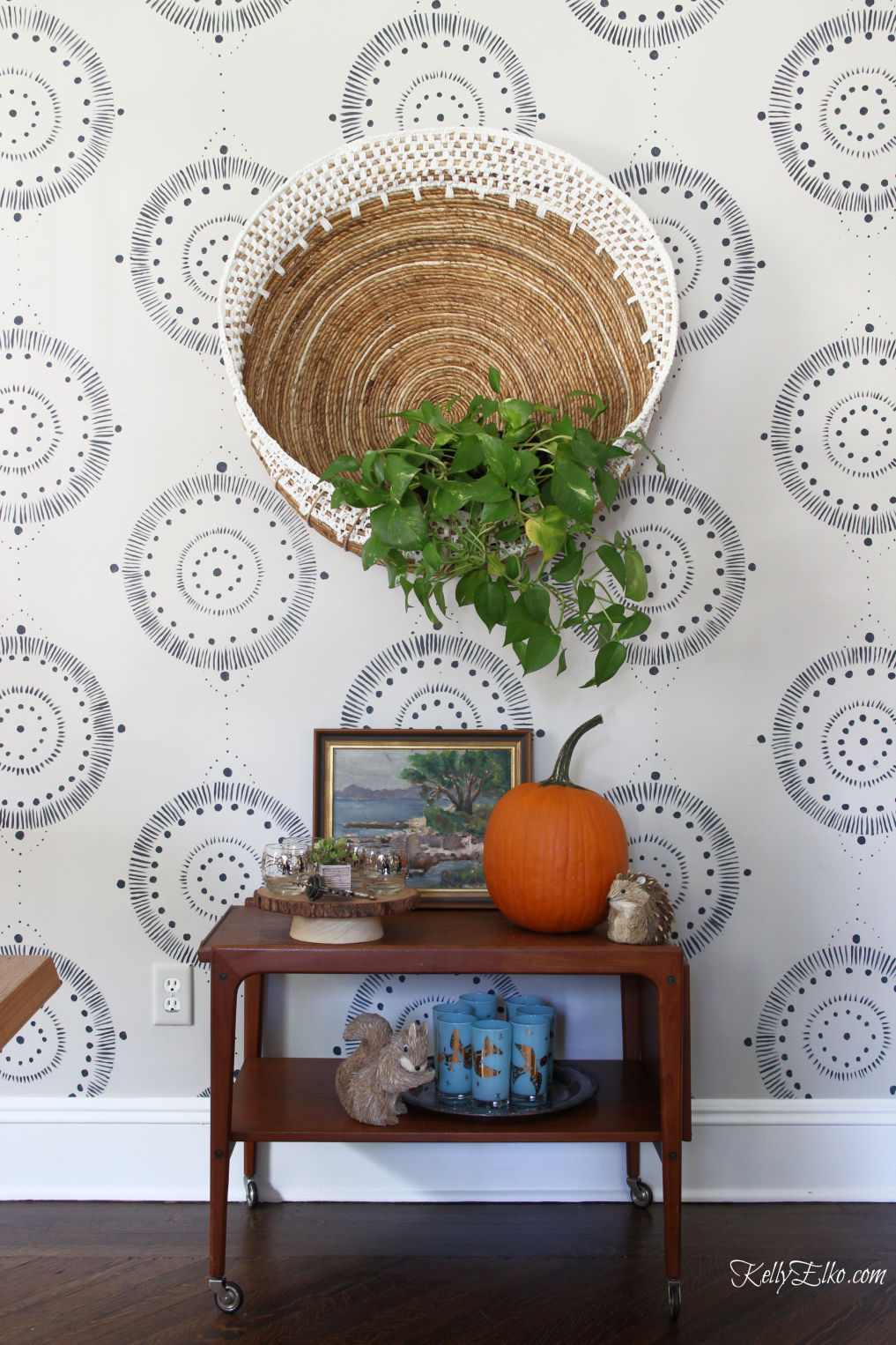 Bar Cart Styling - three different looks! Love the huge wall basket used as a planter for fall and the vintage finds kellyelko.com #barcart #bohodecor #eclecticdecor #homedecor #falldecor #falldecorating #plants #planters #vintagdecor 