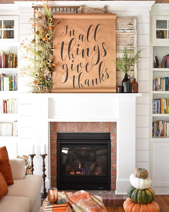 12 Creative Fall Mantels - love the butcher block paper scroll kellyelko.com #fall #falldecor #fallmantel #neutraldecor #farmhousedecor #mantel #manteldecor #vintagedecor #diyideas #diycrafts