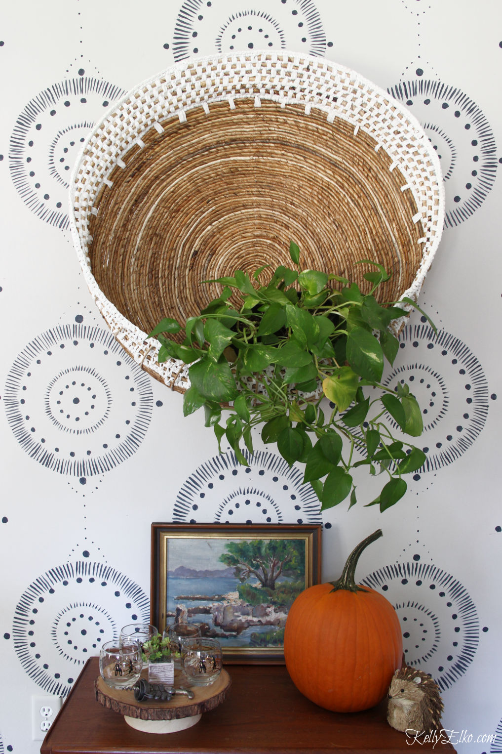 Bar Cart Styling - three different looks! Love the huge wall basket filled with a plant for fall and the vintage finds kellyelko.com #barcart #bohodecor #eclecticdecor #homedecor #falldecor #falldecorating #pumpkins #vintagdecor #plants #planter