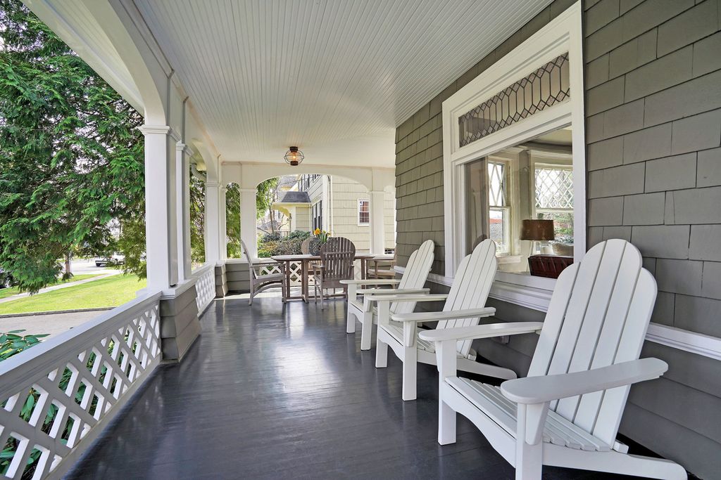 Tour this 1900 home painted gray with beautiful wrap around porch kellyelko.com #porch #frontporch #oldhouse #oldhome #curbappeal #outdoordecor #interiordesign #interiordecor #hometour