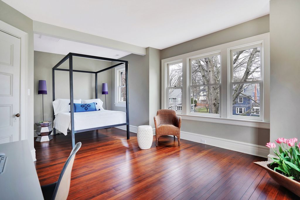 Gray bedroom with four poster bed kellyelko.com #bedroom #bedroomdecor #bedroomfurniture #graypaint #hardwoodfloors #oldhouse 