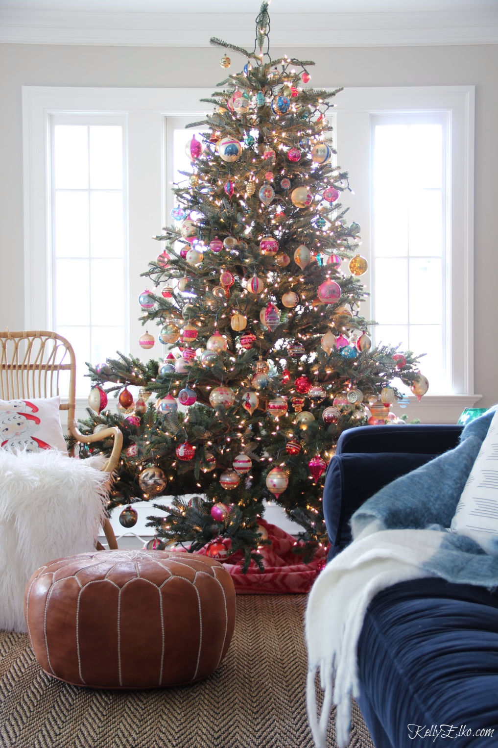 Shiny Brite Christmas Tree - she hung over 300 vintage ornaments on this tree! kellyelko.com #christmas #christmastree #christmasornaments #vintagechristmas #vintagecollections #shinybrite #kellyelko