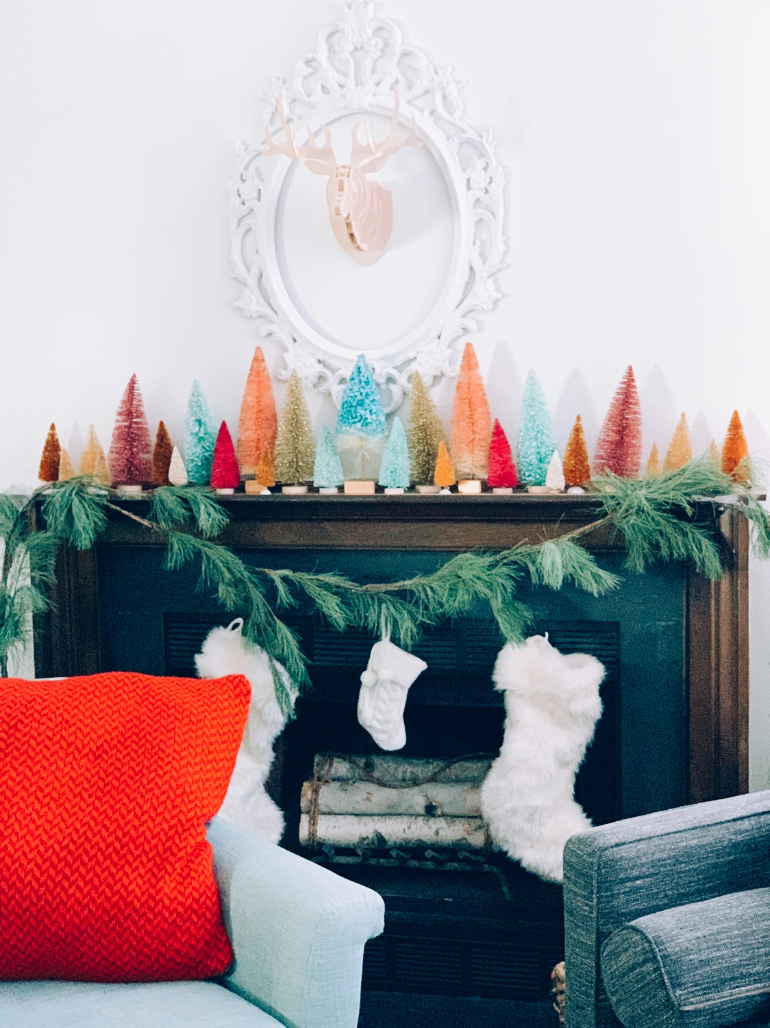 Colorful bottle brush tree Christmas mantel #christmasdecor #christmasmantel #bottlebrushtrees #christmastrees #