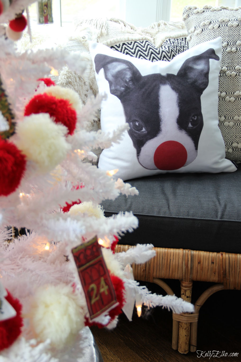 How adorable is this Christmas pillow of a Boston Terrier with a big red Rudolph nose! kellyelko.com #christmasdecor #christmaspillow #christmasdecorations #pillows #bostonterrier #bostonterrierdecor #society6pillow #kellyelko