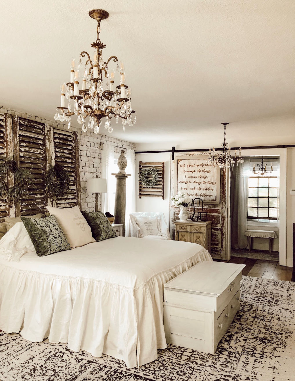 Farmhouse bedroom with brick wallpaper and a shutter headboard #farmhouse #farmhousedecor #farmhousebedroom #vintagedecor #vintagestyle #diyideas #diybed #bed #headboard 