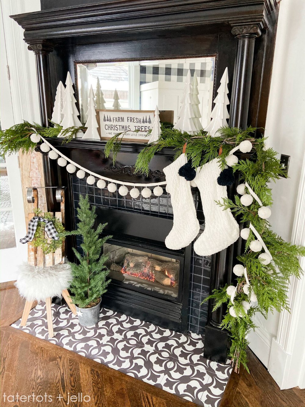 Festive Christmas Decorating Ideas - love this antique fireplace mantel with fresh garland and pom poms #christmas #christmasmantel #christmasdecor #vintagechristmas #christmastrees #fireplace #antiquemantel 