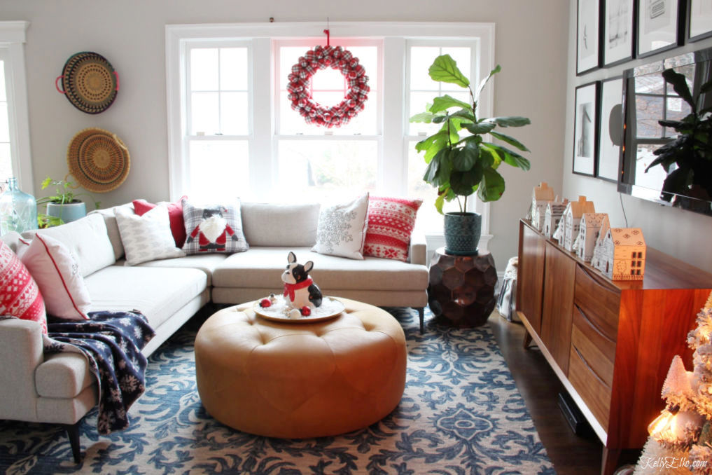 Colorful Christmas Home Tour - love the little Christmas houses, plaid wreath and gnome pillow kellyelko.com #christmas #christmasdecor #christmasdecorating #christmashome #christmastour #diychristmas #christmasideas #christmasmantel #christmastree #christmasornaments #vintagechristmas #farmhousechristmas #colorfulchristmas #creativechristmas #kellyelko #gnome #plaid #christmashouses #christmasfamilyroom 