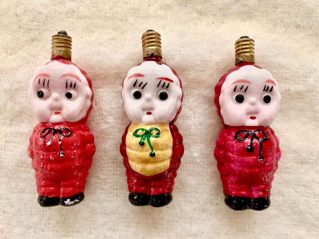 Cute Kewpie doll vintage figural bulbs #vintage #vintagecollections #vintagechristmas #vintagecollectibles #collections #collectibles #collector #christmaslights #milkglass #kewpiedoll