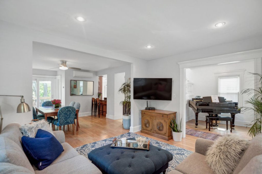 Small space makeover - she transformed this dining room and living room with the proper scale furniture and colorful accessories kellyelko.com #openfloorplan #beforeandafter #homemakeover #diningroomdecor #livingroomdecor #cozy