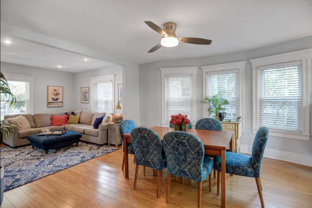 Slow decorating home makeover - small space makeover - she transformed this dining room and living room with the proper scale furniture and colorful accessories kellyelko.com #openfloorplan #beforeandafter #homemakeover #diningroomdecor #livingroomdecor #cozy