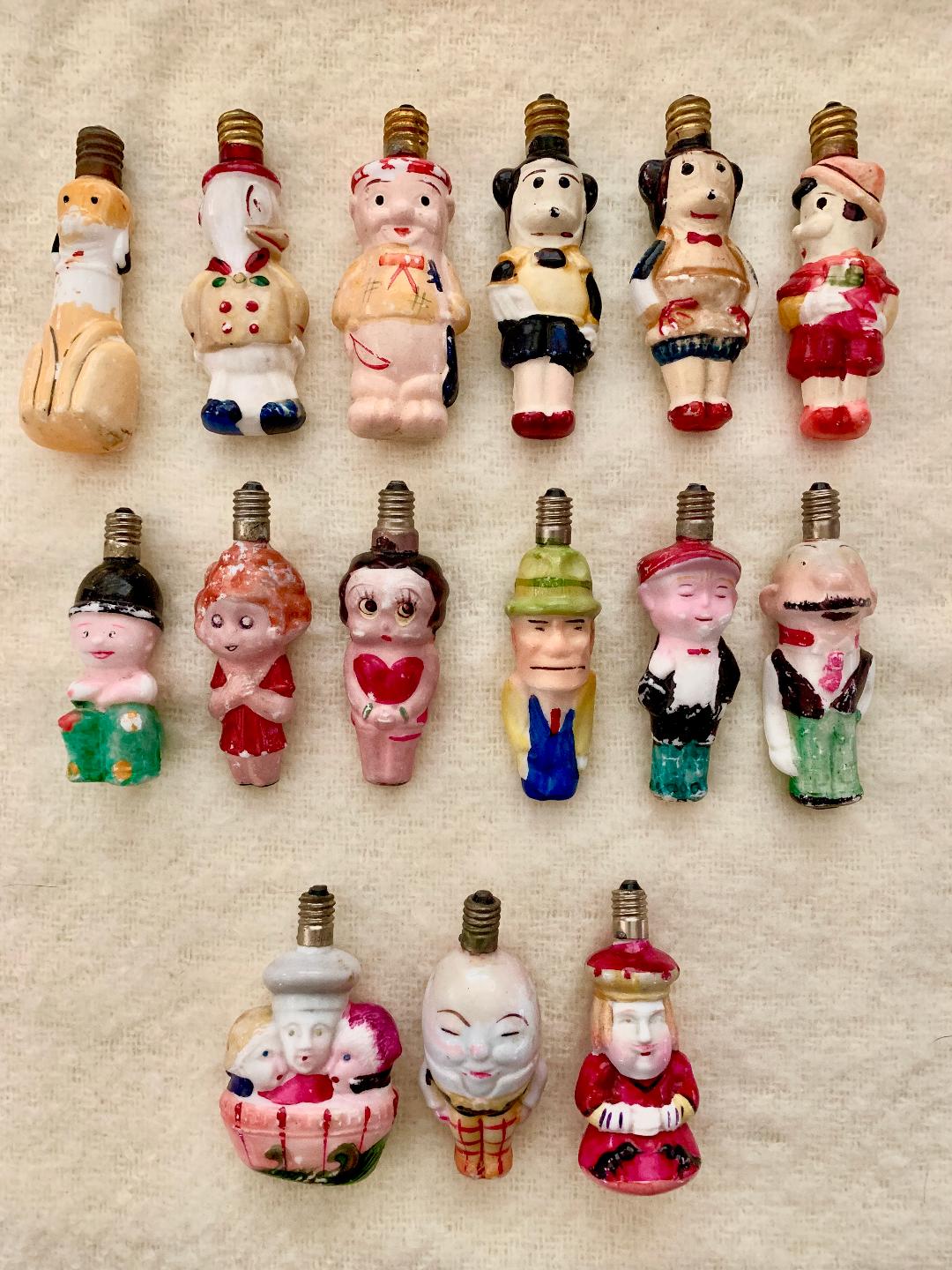 Cool collection of vintage milk glass figural light bulbs #vintage #vintagecollections #vintagechristmas #vintagecollectibles #collections #collectibles #collector #christmaslights #milkglass 