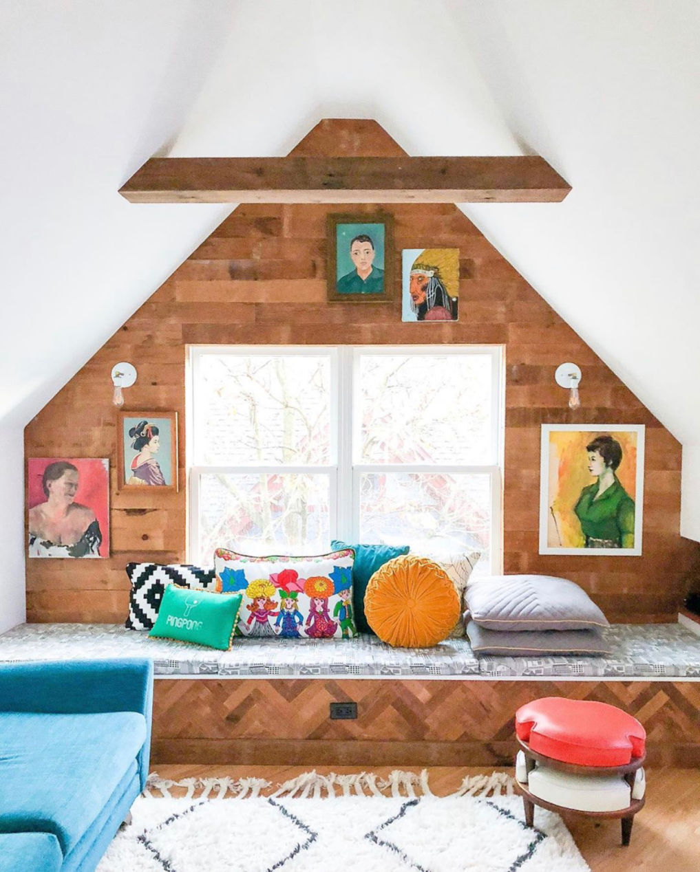 Eclectic Home Tour of Home Ec Interior Design - Love the natural wood shiplap in this attic playroom and the vintage portrait gallery wall #gallerywall #vintagedecor #shiplap #attic #atticdecor #playroom #colorlovers #colorfulinteriors #vintagemodern #bohodecor #eclecticdecor / kellyelko.com