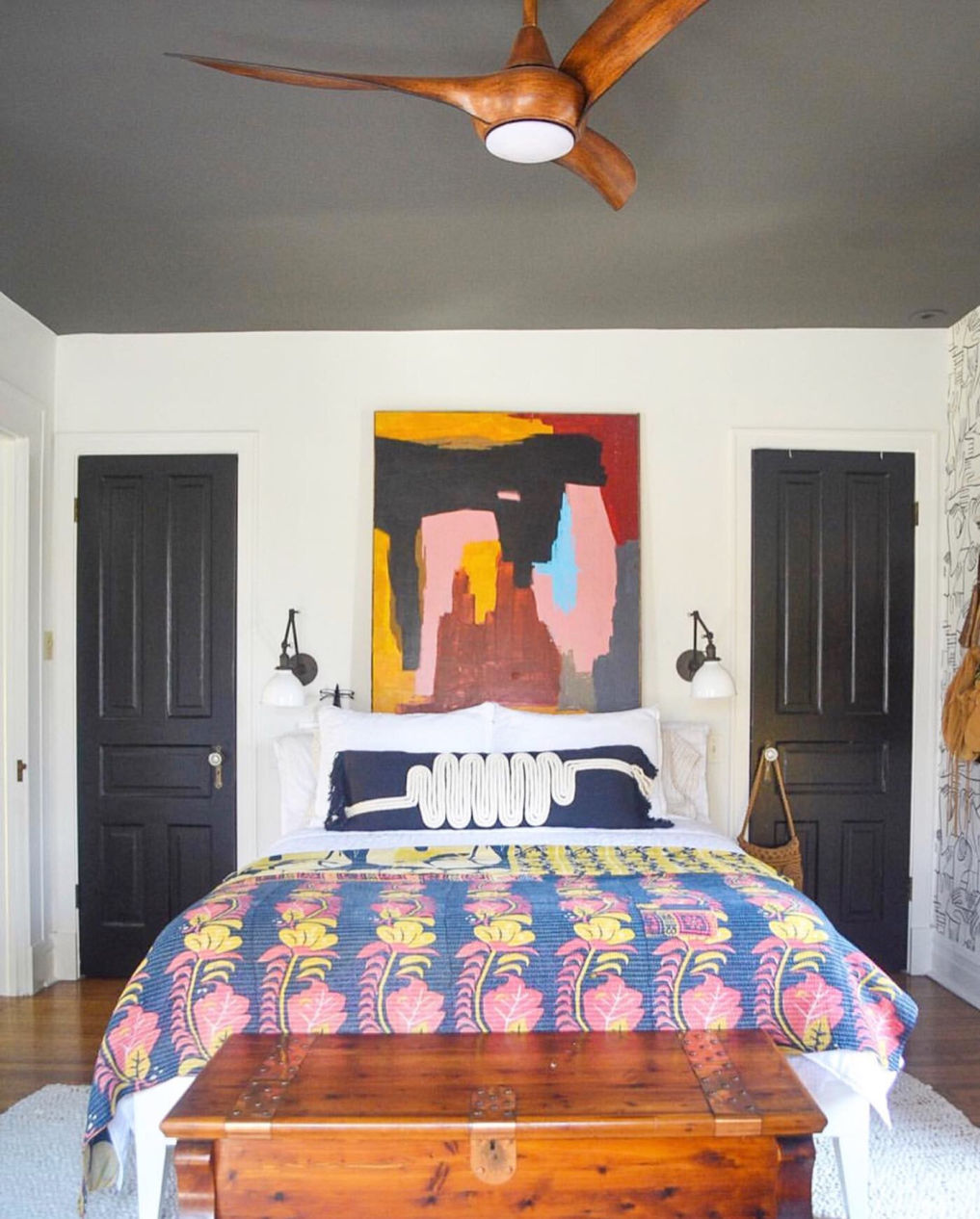 Love this bedroom with gray painted ceiling and black doors #bedroomdecor #bohodecor #bohobedroom #eclecticbedroom #blackceiling #blackdoors #blackpaint #eclecticdecor  / kellyelko.com