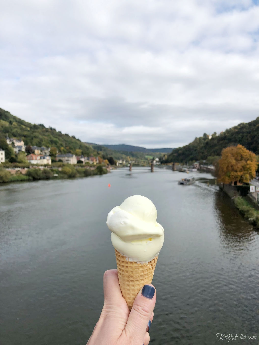 Enjoy an ice cream cone on the bridge in Heidelberg Germany kellyelko.com #germany #heidelberg #luxurytravel #icecreamcone 