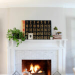 Vintage modern mantel kellyelko.com #mantel #vintagedecor #vintage #houseplants #manteldecor #farmhousedecor #kellyelko