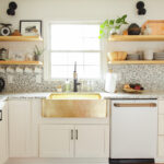 Eclectic Home Tour Cassie Bustamante kellyelko.com #kitchen #kitchendecor #kitchenshelves #openshelves #terrazzo #hometour #housetour #farmhousesink #bohodecor