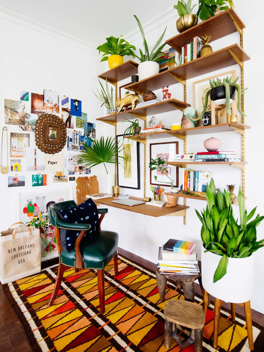 Turn an unused corner into a home office with open shelves and an inspiration board #homeoffice #office #smallspaces #colorful #bohodecor #openshelves #desk #vintagedecor #vintagemodern 