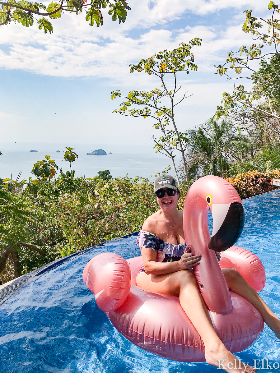 The ultimate Costa Rica villa with infinity edge pool and pink flamingo float! kellyelko.com #travel #travelblogger #vacation #pinkflamingo #girlstrip #birthdaytrip 