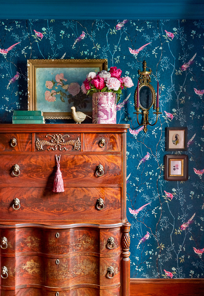 Whimsical blue and pink bird floral wallpaper kellyelko.com #wallpaper #birds #birdwallpaper #floralwallpaper #pinkwallpaper #navyblue #bluewallpaper #bluebedroom #venetianmirror #whimsicaldecor #vintagemodern #pinkflowers #farmhousedecor 
