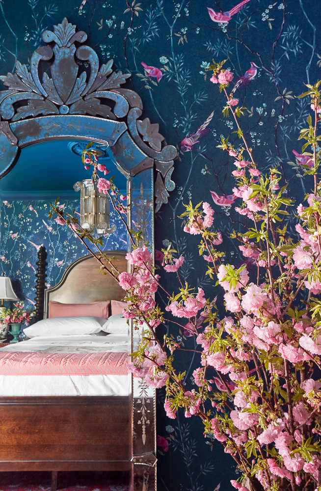 Whimsical blue and pink bird floral wallpaper kellyelko.com #wallpaper #birds #birdwallpaper #floralwallpaper #pinkwallpaper #navyblue #bluewallpaper #bluebedroom #venetianmirror #whimsicaldecor #vintagemodern #pinkflowers #farmhousedecor 