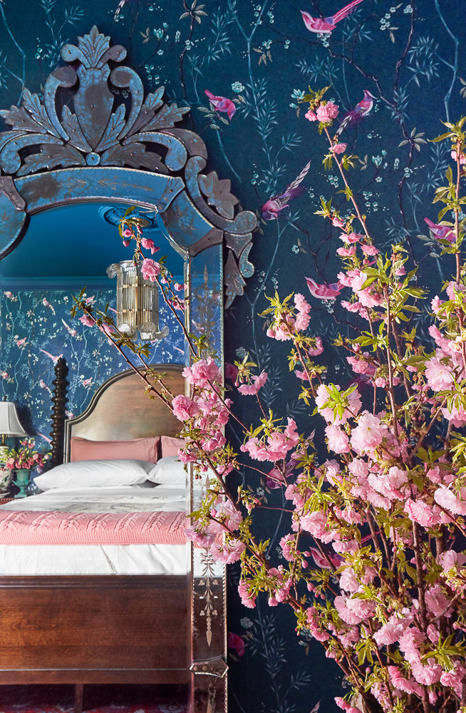 Whimsical blue and pink bird floral wallpaper kellyelko.com #wallpaper #birds #birdwallpaper #floralwallpaper #pinkwallpaper #navyblue #bluewallpaper #bluebedroom #venetianmirror #whimsicaldecor #vintagemodern #pinkflowers #farmhousedecor 