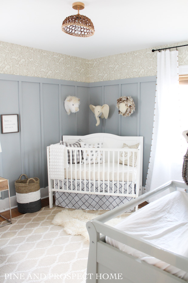 Adorable nursery with board and batten and stenciled walls #nursery #nurserydecor #kidsrooms #farmhousedecor