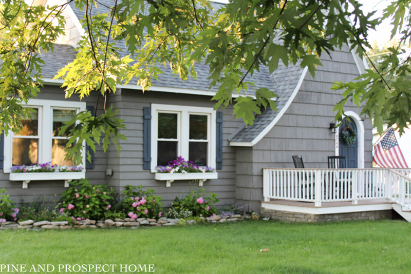 Tour this 1930's cottage filled with tons of DIY ideas #cottage #tudor #curbappeal #hydrangeas #housetour #hometour