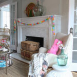 Cherry Blossom Spring Mantel kellyelko.com #spring #springdecor #mantel #springmantel #cherryblossom #floweringbranch #eclecticdecor #farmhousedecor #egggarland #easterdecor #eastercrafts #diyideas #kellyelko