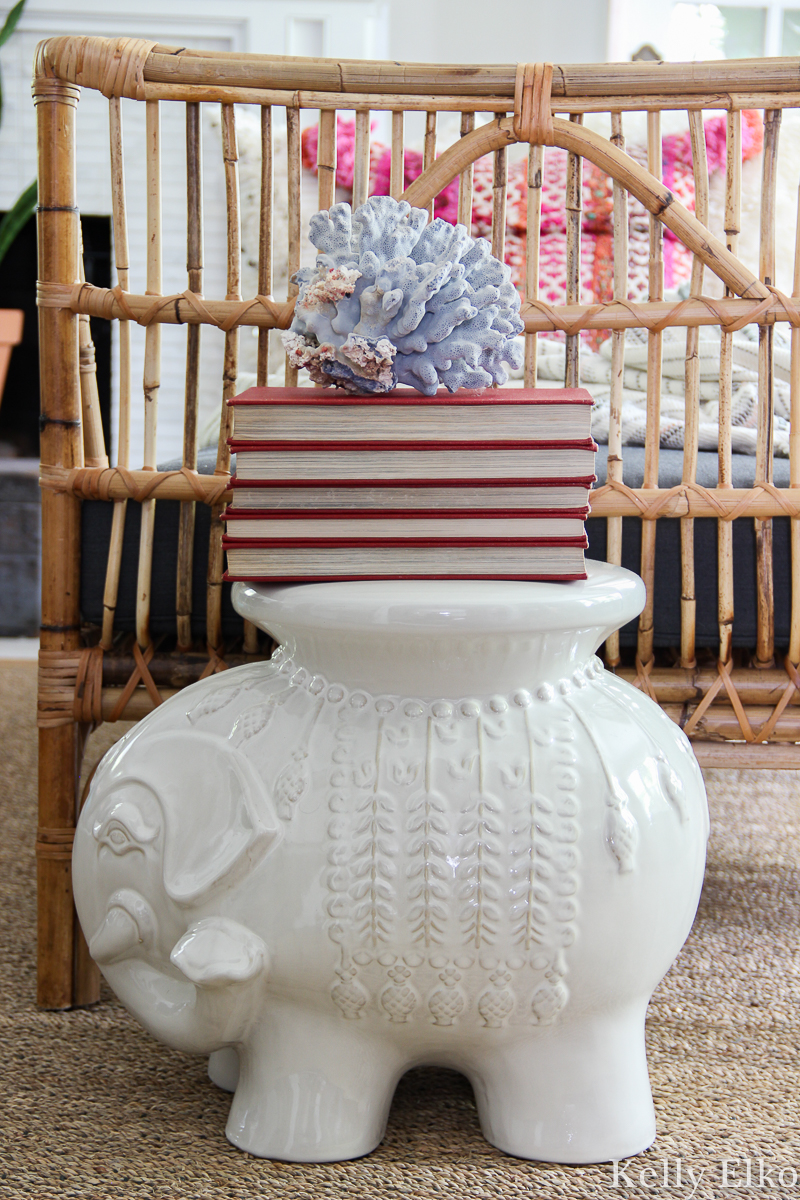 Love this eclectic boho living room with rattan daybed and ceramic elephant stool kellyelko.com #rattan #rattanfurniture #daybed #gardenstool #eclecticdecor #bohodecor #vintagemodern #interiorstyling #vintagedecor #elephantdecor #rattanfurniture #kellyelko #article