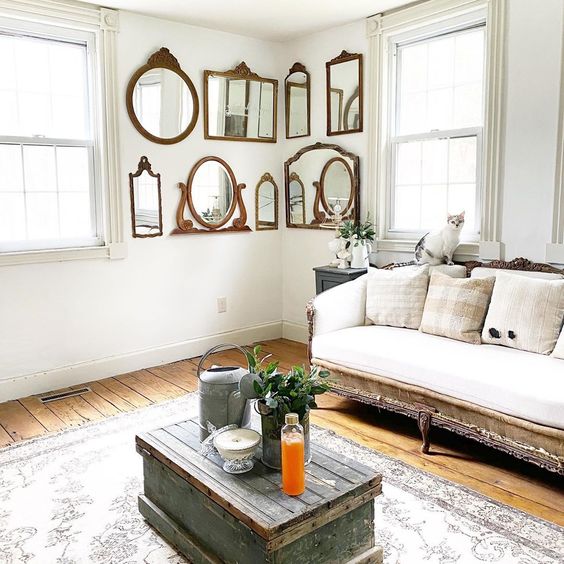 Love this collection of antique mirrors as a unique gallery wall in this charming farmhouse #gallerywall #antique #vintage #vintagedecor #mirrors #wallmirrors #farmhousedecor #vintagedecor #neutraldecor #farmhouse #housetour #hometour 