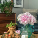 Vintage Troll Doll Planter kellyelko.com #troll #trolls #vintagedecor #crafts #diycrafts #planters #diyplanters #succulents #peonies #upcycle #repurpose #vintagedecor #kitsch #kitschy