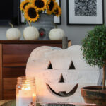 Vintage fall decor kellyelko.com #fall #falldecor #pumpkindecor #whitepumpkin #sunflowers #eclecticdecor