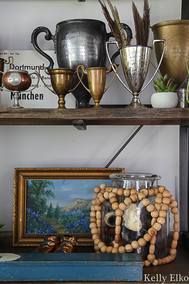 Love her unique collections like these antique loving cups kellyelko.com #lovingcups #trophy #vintagedecor #antiquedecor #collections #vintagecollections #patina #falldecor 