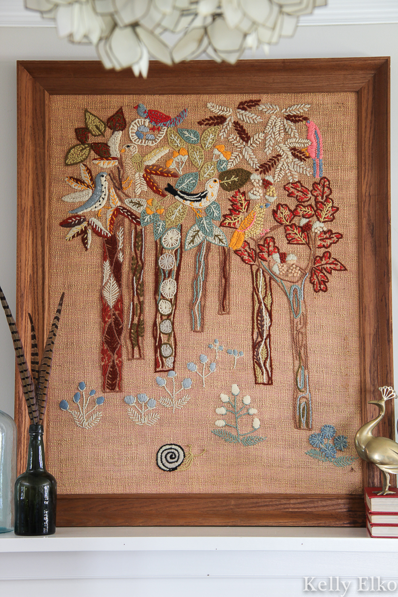 This is a fantastic example of Erica Wilson crewel work - I love the details on the birds and trees kellyelko.com #crewel #crewelart #art #vintageart #vintagedecor #kitsch #retro #vintagedecor #ericawilson #eclecticdecor 