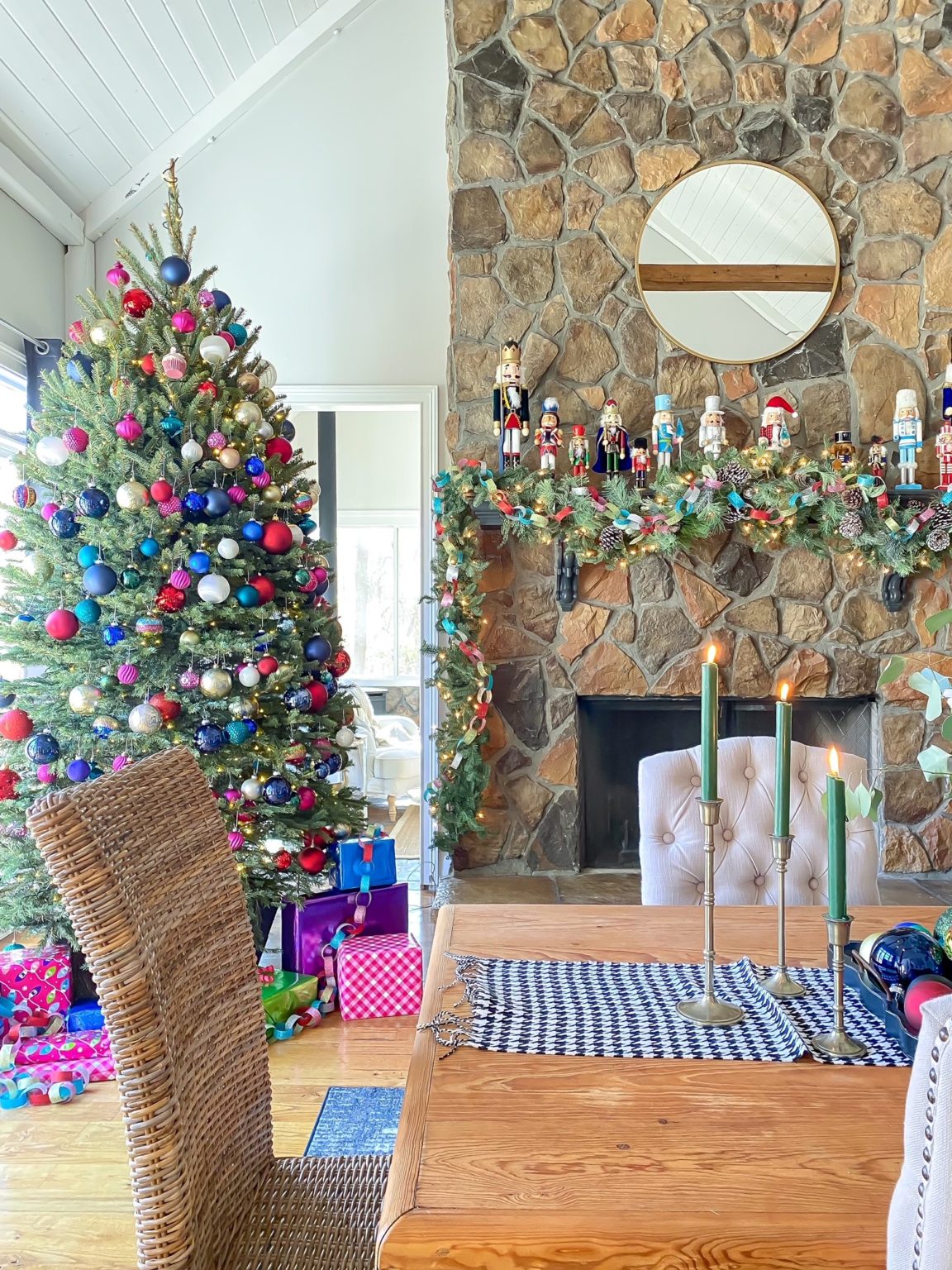 Love this colorful Christmas tree and mantel #colorfulchristmas #christmastree #nutcrackers #christmasmantel 