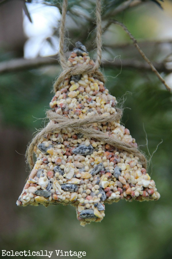 Get the recipe to make these adorable birdseed ornaments kellyelko.com #ornaments #kidscrafts #diyornaments #diychristmas #farmhousechristmas 