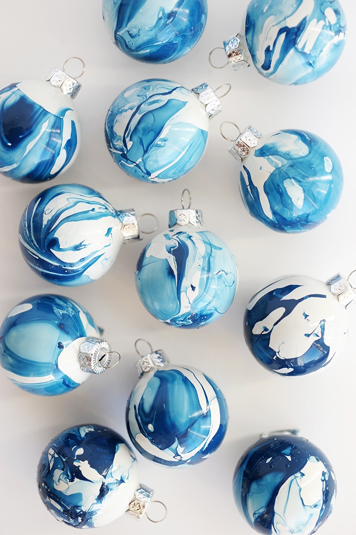 Unique DIY Ornaments - I love these marbled ornaments made using nail polish