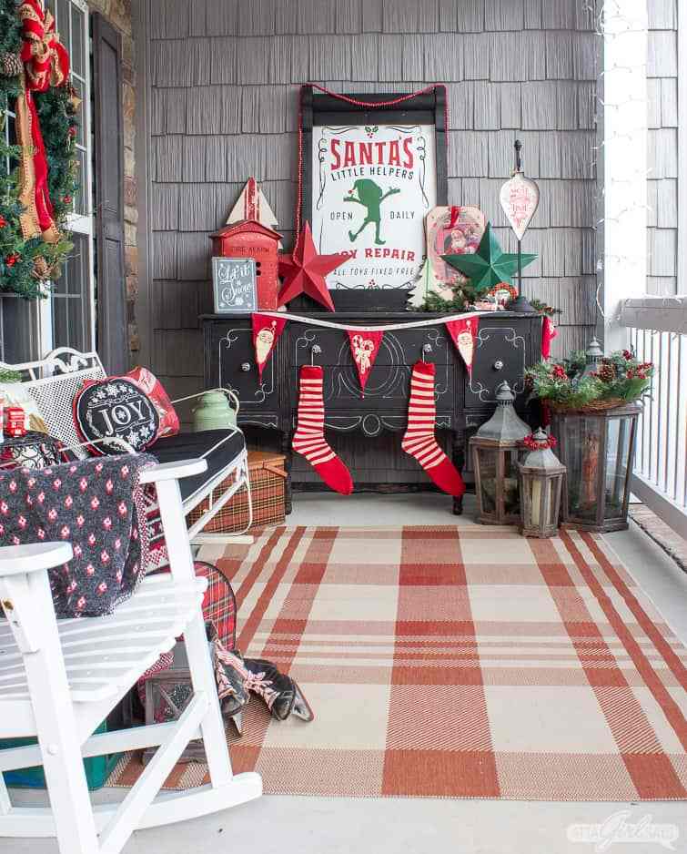 Love this whimsical Christmas porch #christmas #christmasporch #outdoorchristmasdecor #vintagechristmas #retrochristmas #diychristmas 