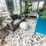 Ruggable Rug Honest Review - kellyelko.com #ruggable #ruggablerug #sunroom #eclecticdecor #leopard #leopardprint #leopardrug #plantslady #houseplants #vintagedecor #jungalow