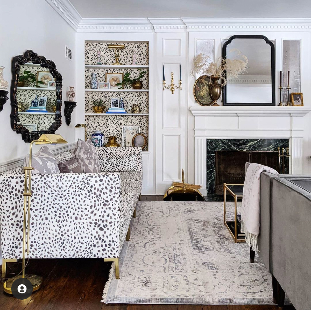 Tour this beautiful 1935 brick Colonial filled with beautiful decorating ideas (like the vintage wallpaper on the bookcases 