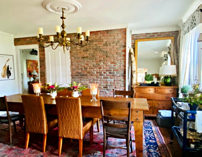 Old farmhouse with original exposed brick walls 