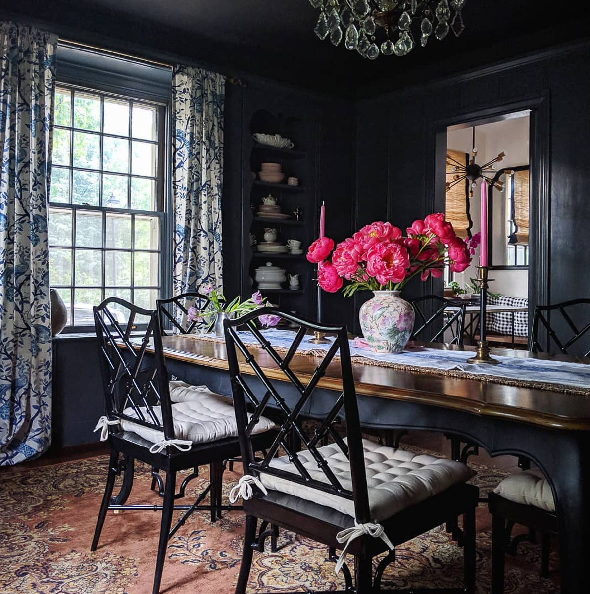 Love this dramatic dining room with gel stained walls in a dark and moody color