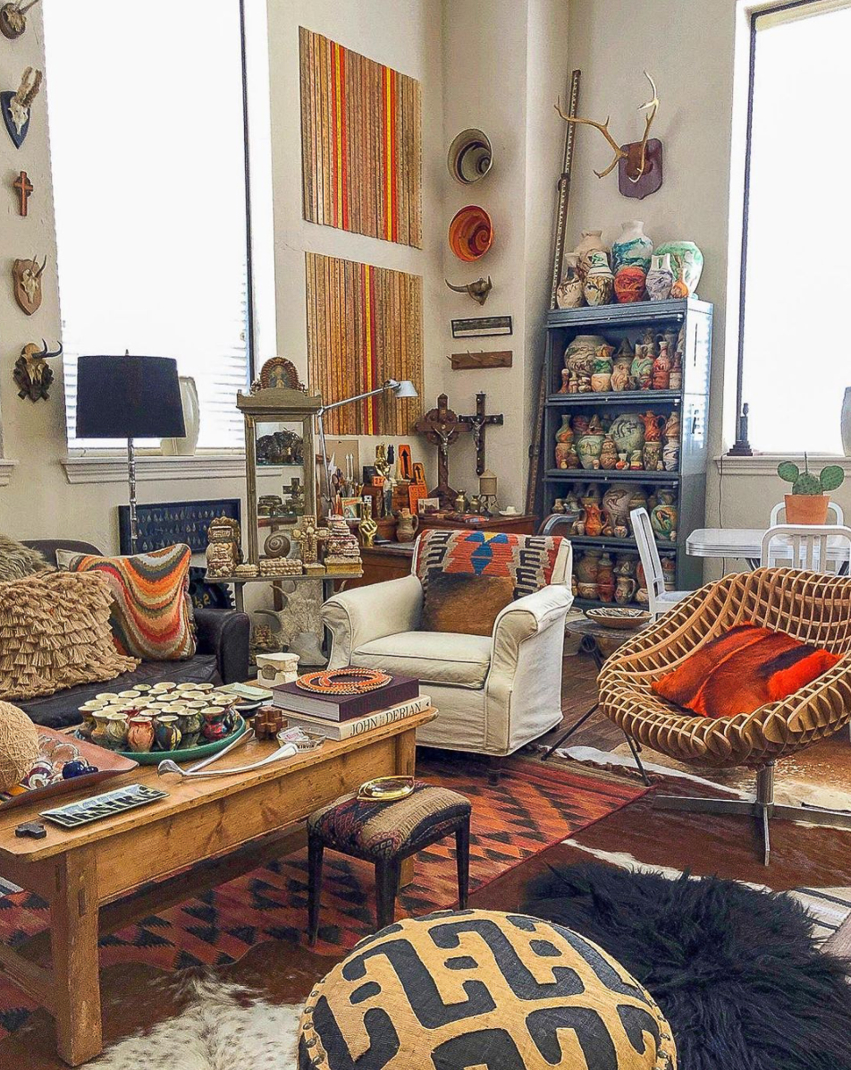 This home is a perfect example of cluttercore! He displays his favorite finds in meaningful ways