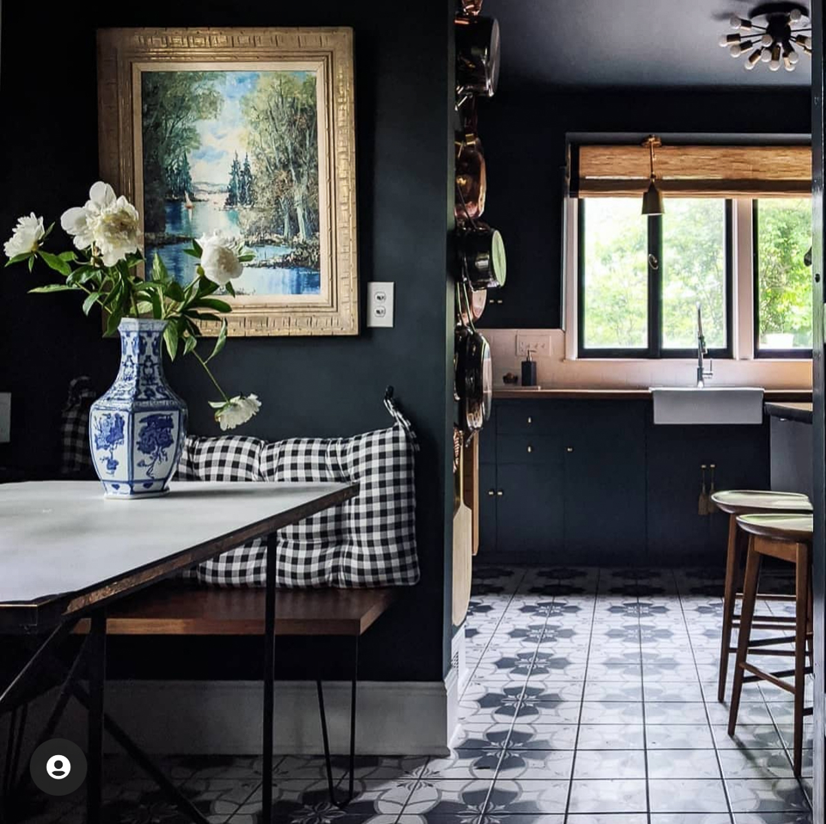 Love this vintage modern kitchen renovation and dramatic dark paint color